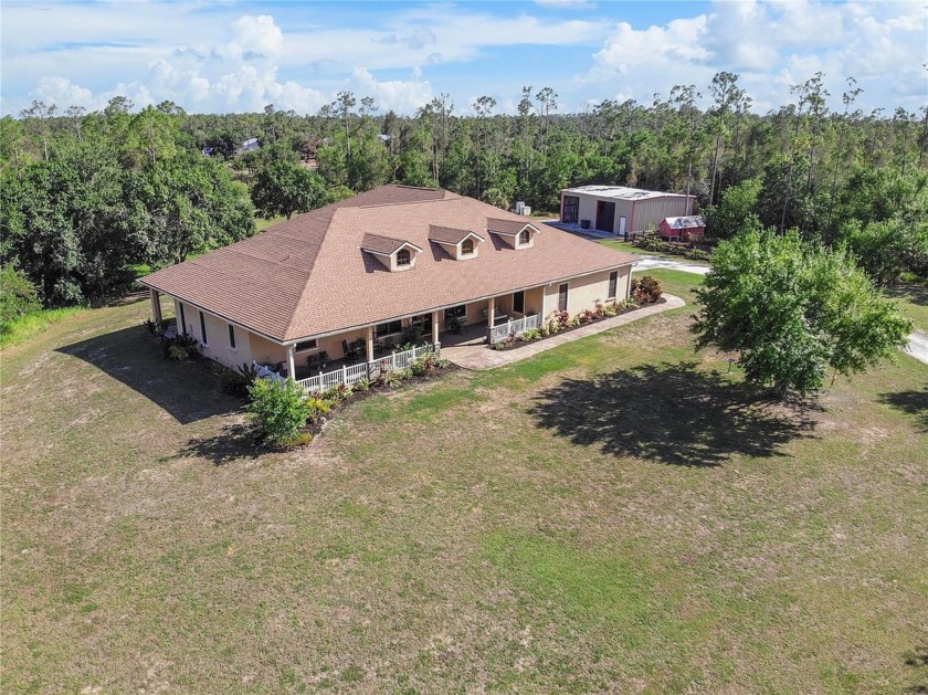 Experience tranquil country living at its finest with this - Beach Home for sale in North Fort Myers, Florida on Beachhouse.com