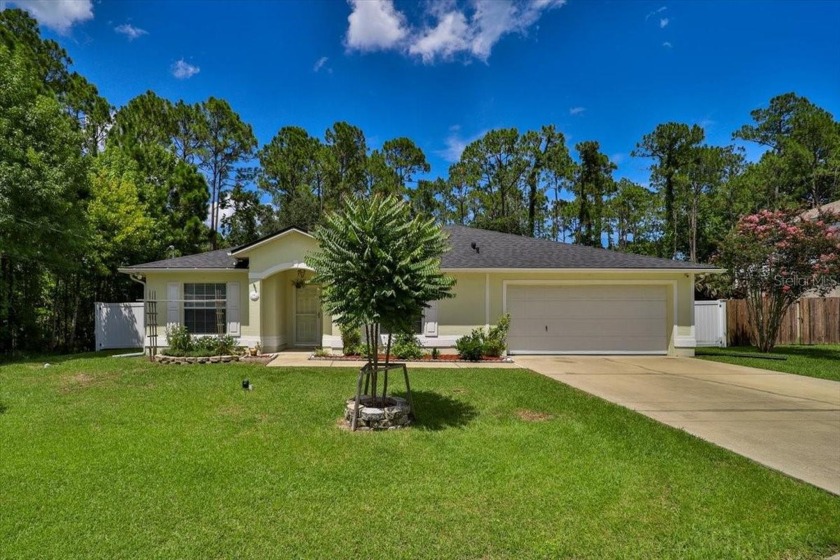 Welcome Home! This charming 3-bedroom, 2-bathroom residence - Beach Home for sale in Palm Coast, Florida on Beachhouse.com