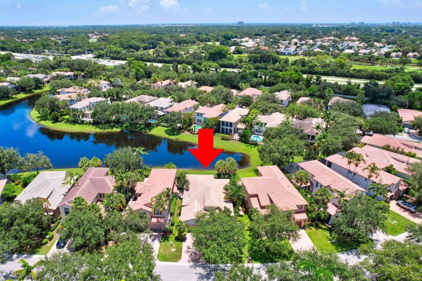 Welcome to this immaculate lakefront single-family home with a - Beach Home for sale in Palm Beach Gardens, Florida on Beachhouse.com