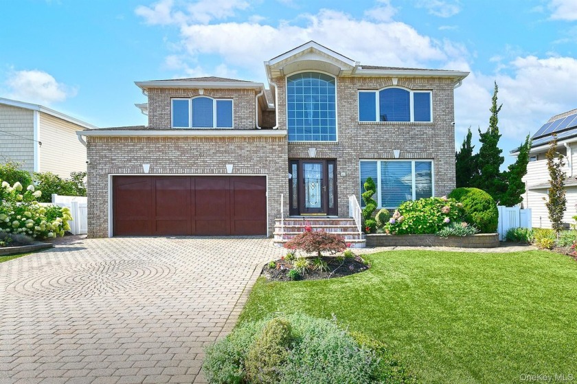 Welcome to 83 Fairwater, a young home with panoramic views of - Beach Home for sale in Massapequa, New York on Beachhouse.com