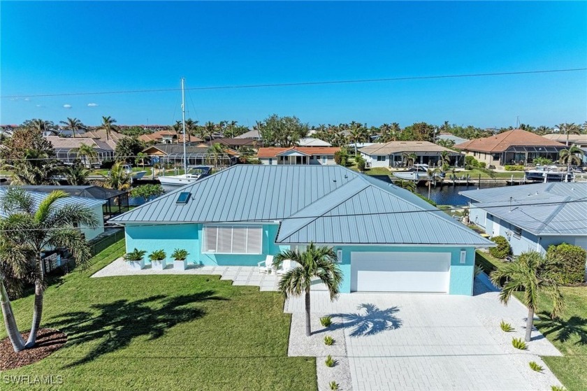 Welcome to this exquisite 3-bedroom, 2-bathroom waterfront home - Beach Home for sale in Punta Gorda, Florida on Beachhouse.com