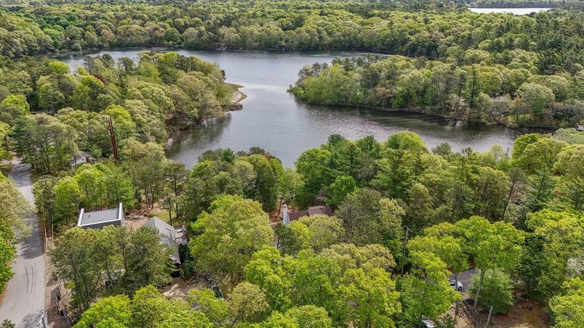 This turn-key home offers stunning views of Deep Pond with - Beach Home for sale in East Falmouth, Massachusetts on Beachhouse.com