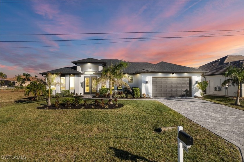 Modern Gulf Access Pool Home overlooking a wide canal near the 7 - Beach Home for sale in Cape Coral, Florida on Beachhouse.com