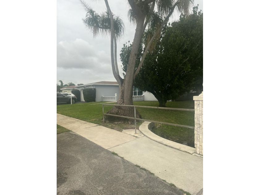 This incredible and very spacious fully upgraded home. Features - Beach Home for sale in Lauderdale Lakes, Florida on Beachhouse.com