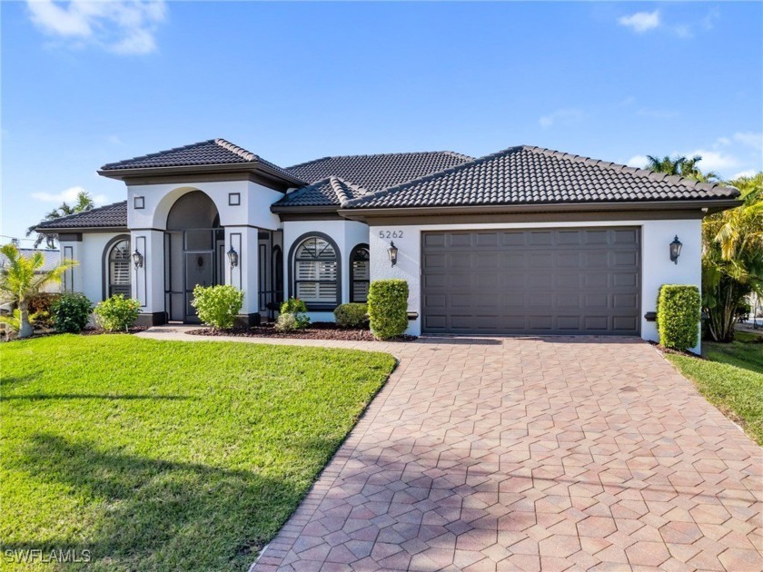 Sold turnkey, this waterfront home with gulf access is YOUR - Beach Home for sale in Cape Coral, Florida on Beachhouse.com