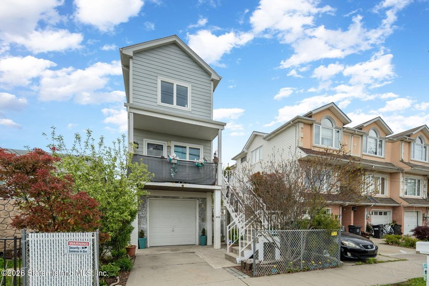 Enjoy your morning coffee on the front porch while taking in - Beach Home for sale in Staten Island, New York on Beachhouse.com