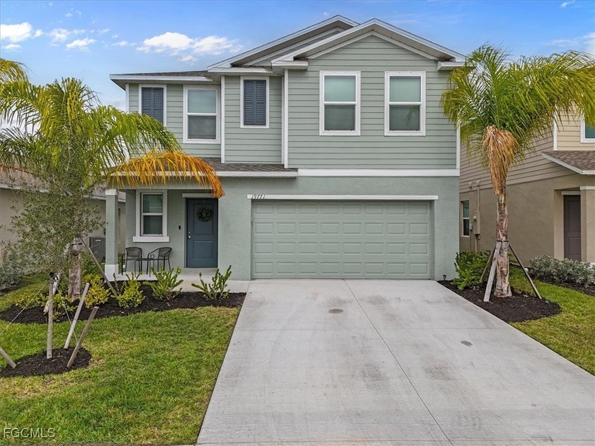 Welcome to this nearly new, two-story residence built in 2025 - Beach Home for sale in Lehigh Acres, Florida on Beachhouse.com