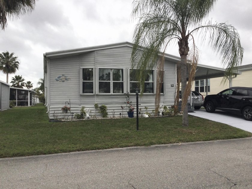 ONE OF THE LARGEST HOMES IN THIS COMMUNITY. THIS 1560 SF HOME IS - Beach Home for sale in Port Saint Lucie, Florida on Beachhouse.com