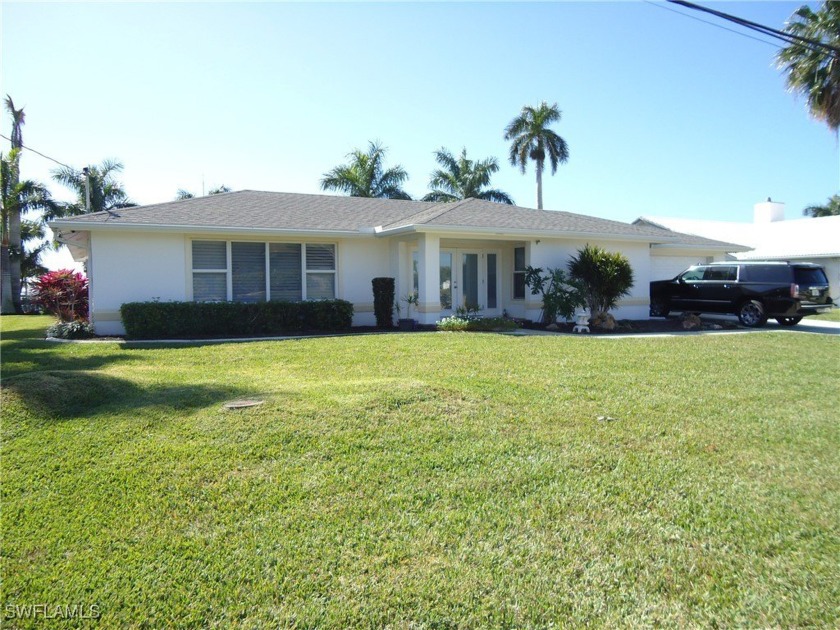 Beautifully remodeled custom pool home in the Desirable Orchid - Beach Home for sale in Cape Coral, Florida on Beachhouse.com