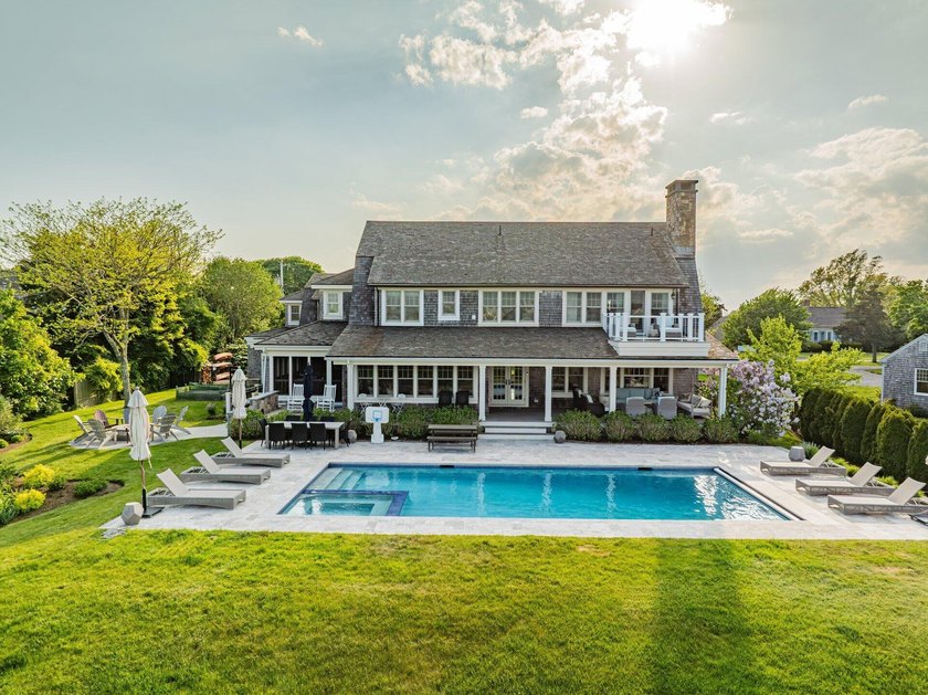 Located within the coveted seaside enclave of Salten Point, this - Beach Home for sale in Barnstable, Massachusetts on Beachhouse.com