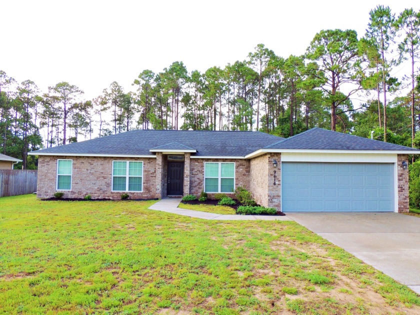 Welcome to your new home! This lovely home is situated on a - Beach Home for sale in Navarre, Florida on Beachhouse.com