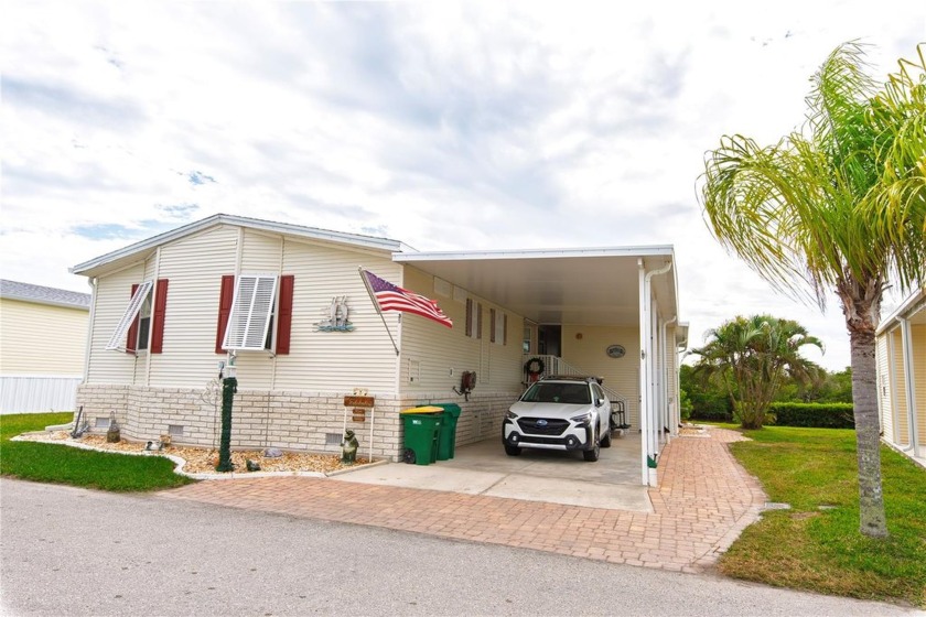 Nestled in the desirable 55+ community of Windmill Village, this - Beach Home for sale in Punta Gorda, Florida on Beachhouse.com