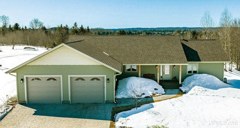 Set in the peaceful countryside of Tapiola, MI, this high-end 4 - Beach Home for sale in Chassell, Michigan on Beachhouse.com