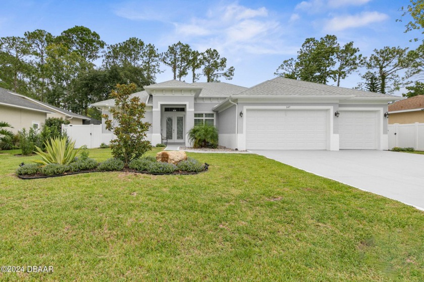 Welcome to your dream home in the sought after Cypress Knolls - Beach Home for sale in Palm Coast, Florida on Beachhouse.com