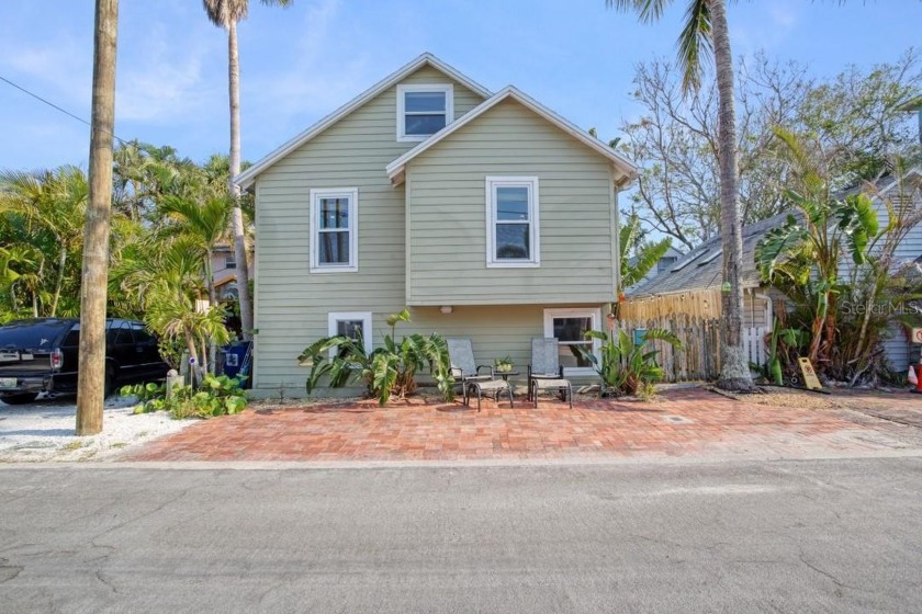 This spacious sun drenched 2 bedroom 2 bath multilevel cottage - Beach Home for sale in Treasure Island, Florida on Beachhouse.com