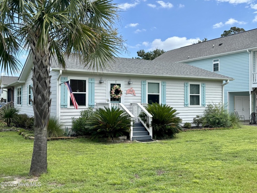 This beautifully updated 3-bedroom, 2-bath Oak Island cottage is - Beach Home for sale in Oak Island, North Carolina on Beachhouse.com