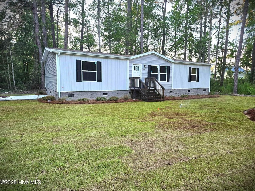 Approx 3 minutes to Sunset Beach NC! Discover your dream home in - Beach Home for sale in Calabash, North Carolina on Beachhouse.com