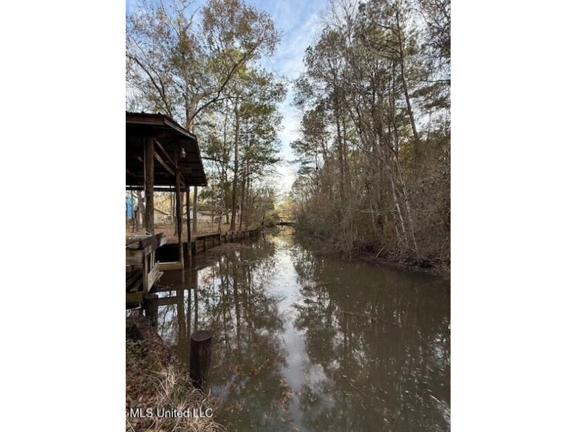 Discover your slice of bayou-front living with this exceptional - Beach Lot for sale in Gautier, Mississippi on Beachhouse.com