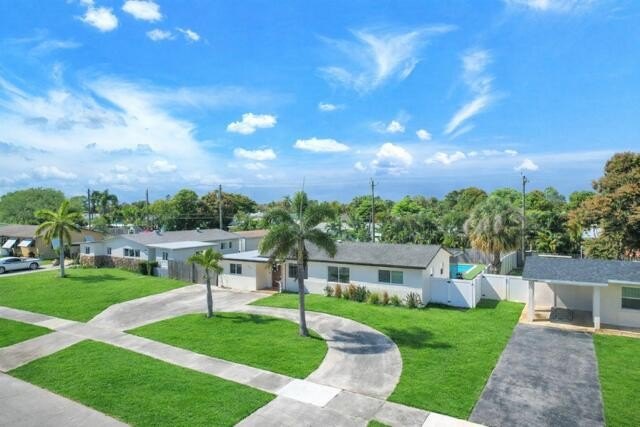Welcome to this beautifully remodeled 3-bedroom plus extra room - Beach Home for sale in West Palm Beach, Florida on Beachhouse.com
