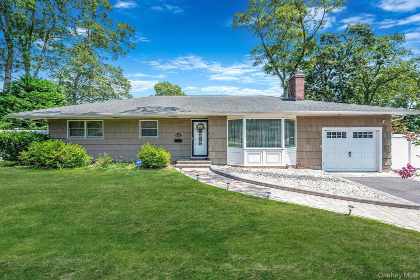 Welcome to this beautifully updated ranch located on one of - Beach Home for sale in Patchogue, New York on Beachhouse.com