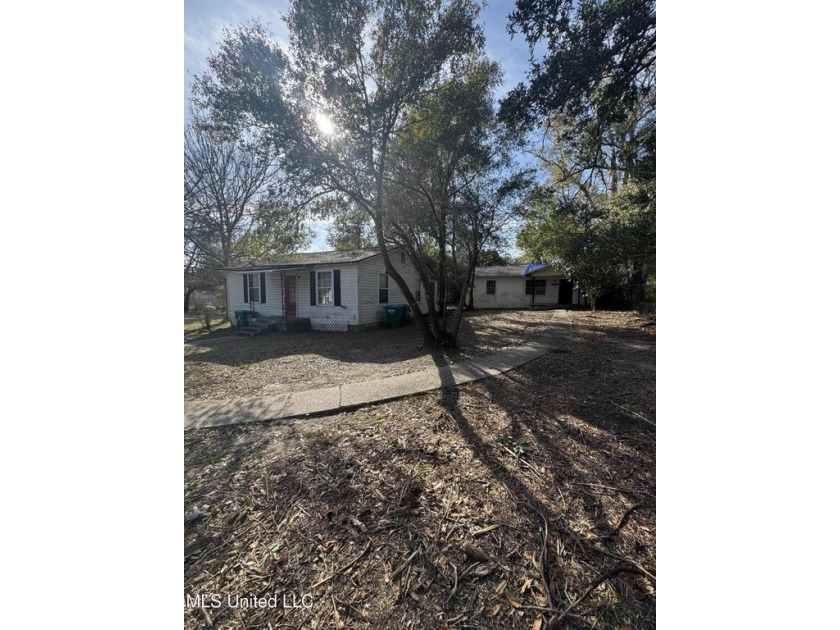 CALLING ALL INVESTORS!House one is a Wood Siding HomeThis - Beach Home for sale in Gulfport, Mississippi on Beachhouse.com