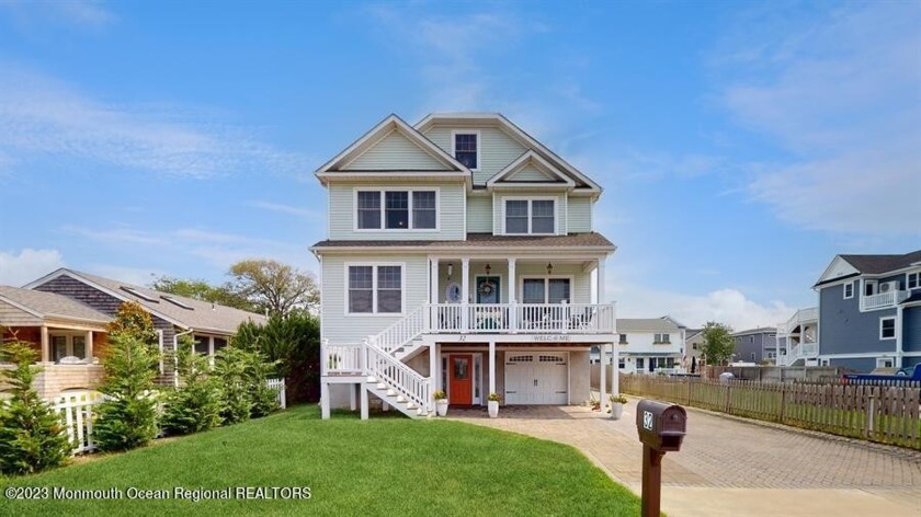 Location is key! Blocks to the beach. This spacious elevated - Beach Home for sale in Manasquan, New Jersey on Beachhouse.com