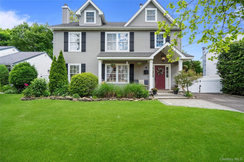 Welcome to this beautiful Colonial located in the heart of - Beach Home for sale in Massapequa, New York on Beachhouse.com