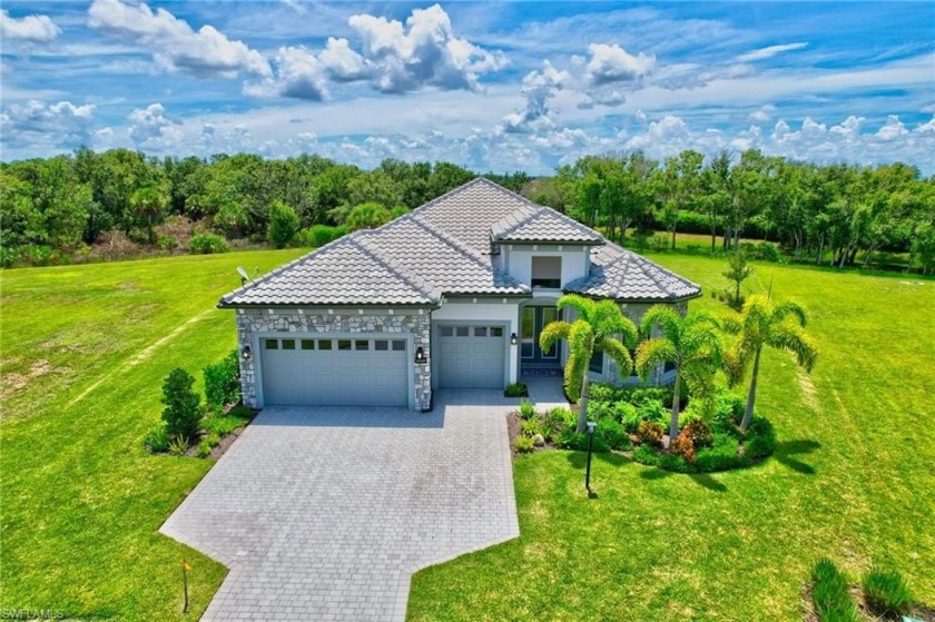 Nestled on an expansive private lot, in the distinguished, gated - Beach Home for sale in Estero, Florida on Beachhouse.com