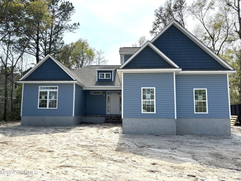 Bright, open floor plan in an amazing area! Construction has - Beach Home for sale in Hampstead, North Carolina on Beachhouse.com