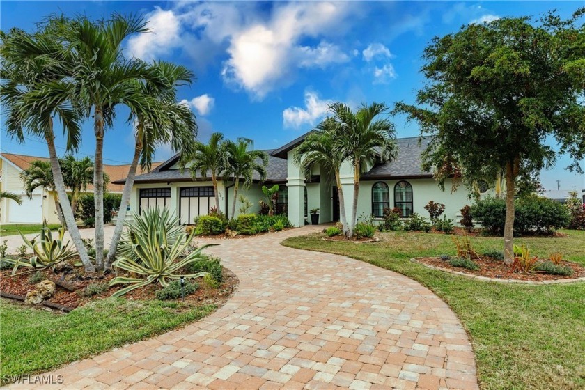 Nestled in the sought-after Rose Garden neighborhood (walking - Beach Home for sale in Cape Coral, Florida on Beachhouse.com