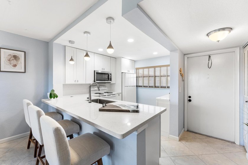 Welcome to easy living in this beautifully updated home located - Beach Condo for sale in Lake Worth, Florida on Beachhouse.com