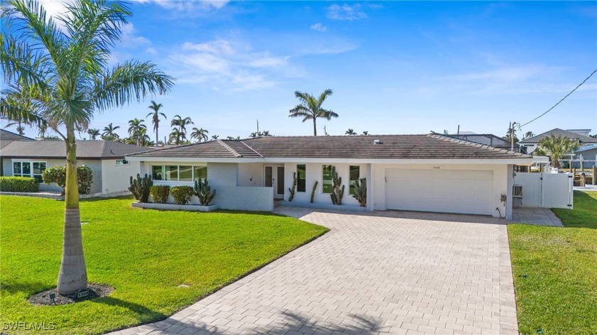 Welcome to your modern dream home in the prestigious Cape Coral - Beach Home for sale in Cape Coral, Florida on Beachhouse.com