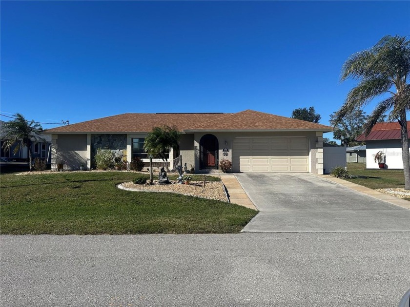 GORGEOUS 2/2 WATERFRONT Gulf Access HOME - Only 5 Min to the - Beach Home for sale in Port Charlotte, Florida on Beachhouse.com