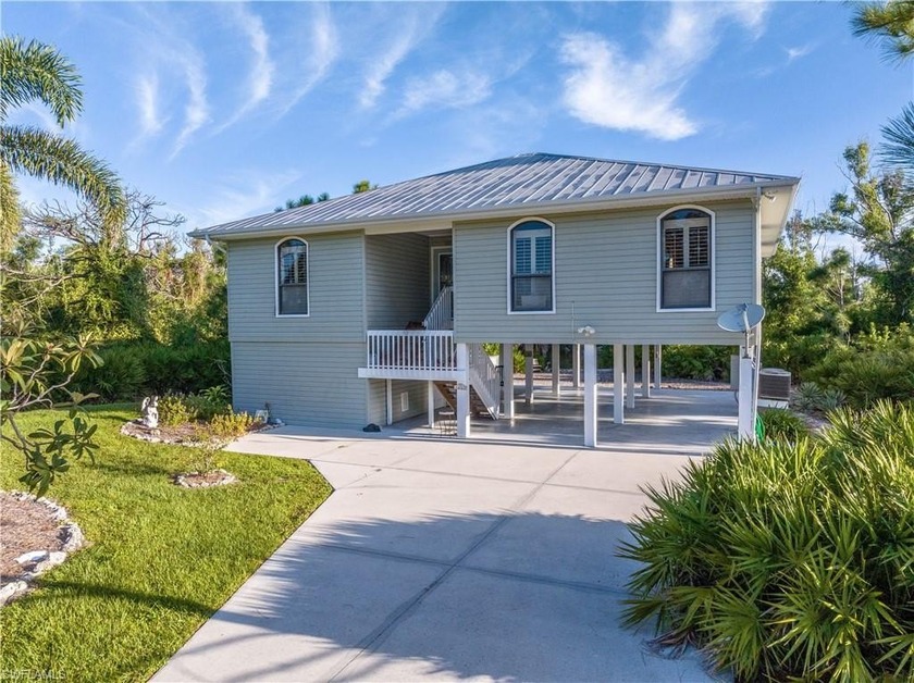Nestled on a quiet street in St. James City, this beautifully - Beach Home for sale in ST. James City, Florida on Beachhouse.com