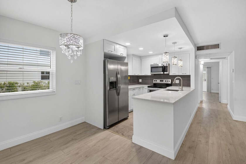 Beautifully remodeled and filled with natural light, this - Beach Condo for sale in Delray Beach, Florida on Beachhouse.com
