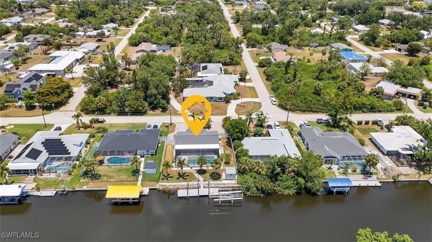 Indulge in waterfront living with southern exposure!! Charming - Beach Home for sale in Port Charlotte, Florida on Beachhouse.com