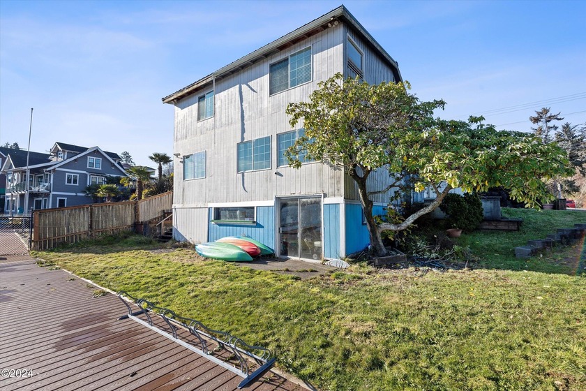 Located on the North end of Devils Lake in Lincoln City, this - Beach Condo for sale in Lincoln City, Oregon on Beachhouse.com