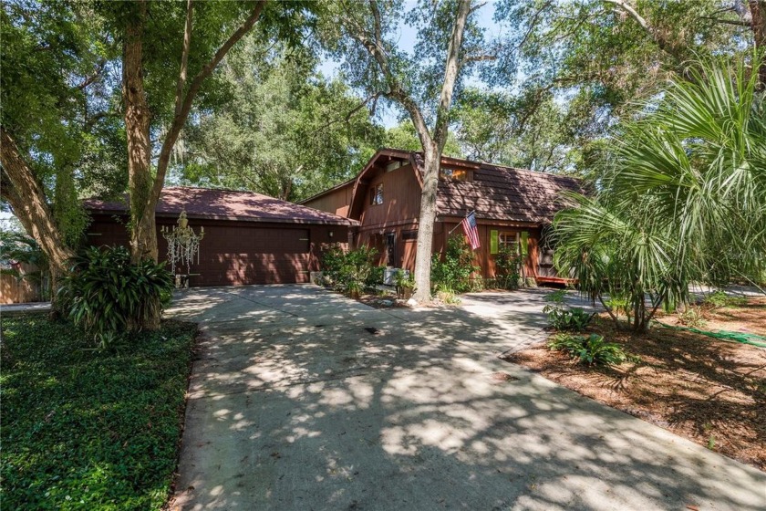 Under contract-accepting backup offers. This one-of-a-kind log - Beach Home for sale in Palm Harbor, Florida on Beachhouse.com