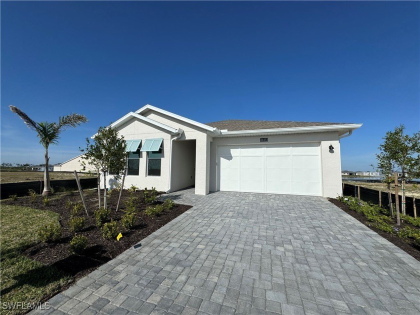 STUNNING NEW CONSTRUCTION HOME IN BABCOCK RANCH! Boasting an - Beach Home for sale in Punta Gorda, Florida on Beachhouse.com