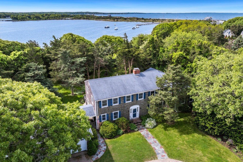 Discover the timeless charm of this Chapoquoit Island waterfront - Beach Home for sale in Falmouth, Massachusetts on Beachhouse.com