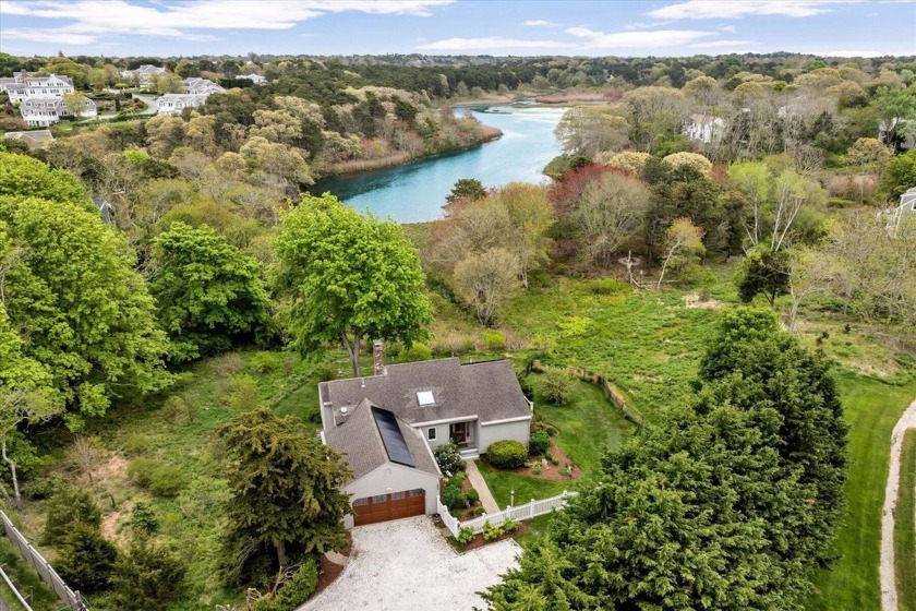 Nestled on a sprawling 1.55-acre parcel set back from Route 28 - Beach Home for sale in North Chatham, Massachusetts on Beachhouse.com