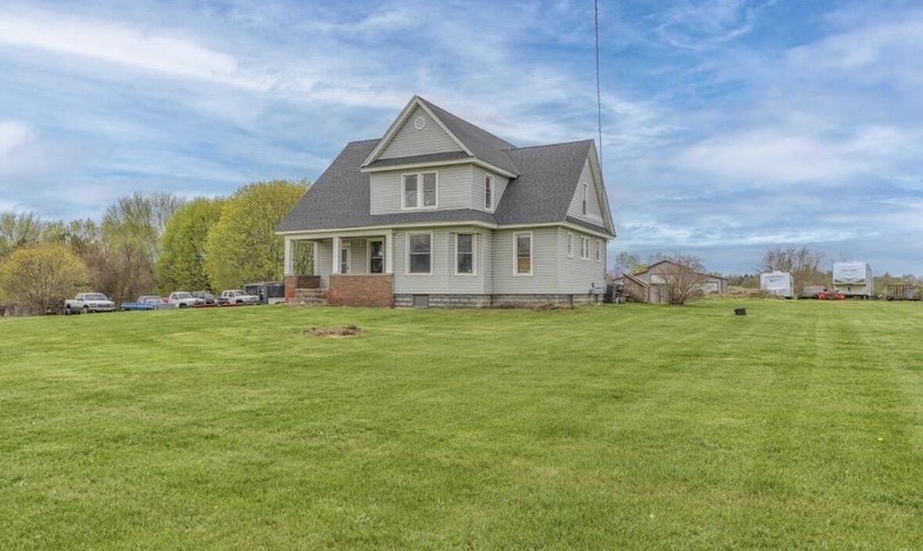 Looking for land in a quiet area and a large farmhouse with - Beach Home for sale in Benton Harbor, Michigan on Beachhouse.com