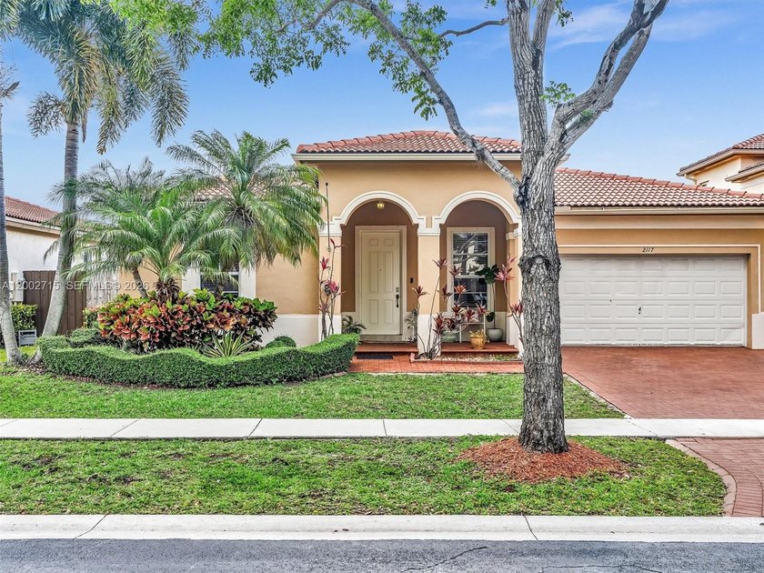 Stunning Mediterranean-style home, beautifully landscaped, in - Beach Home for sale in Homestead, Florida on Beachhouse.com