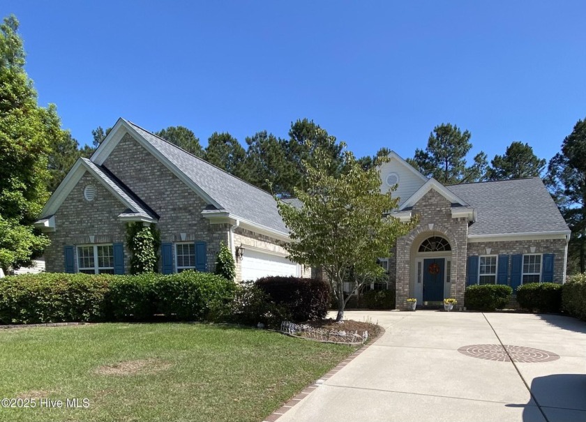 Exceptional Sandpiper Bay Golf Course living and the beauty of - Beach Home for sale in Sunset Beach, North Carolina on Beachhouse.com