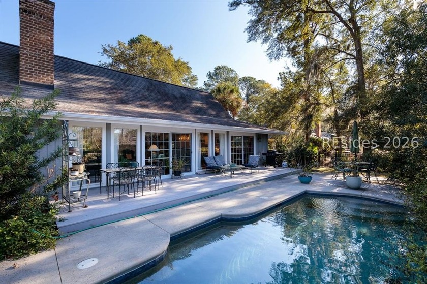 Ready for your own personal pool and secret garden? Stylish - Beach Home for sale in Hilton Head Island, South Carolina on Beachhouse.com