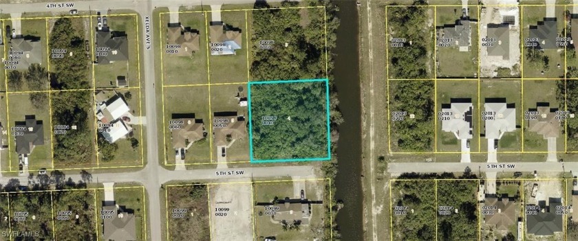 This over-sized vacant lot with a canal to the side is located - Beach Lot for sale in Lehigh Acres, Florida on Beachhouse.com