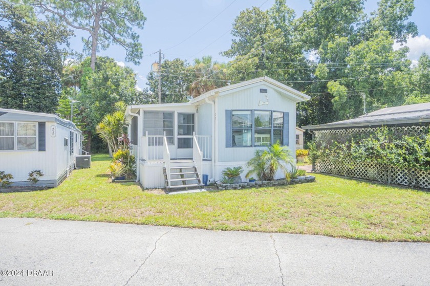 Welcome to your serene retreat in Edgewater, FL; a charming - Beach Home for sale in Edgewater, Florida on Beachhouse.com