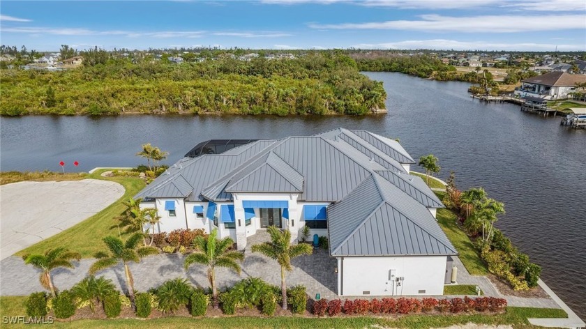 This 2023 custom-built masterpiece redefines luxury living - Beach Home for sale in Cape Coral, Florida on Beachhouse.com