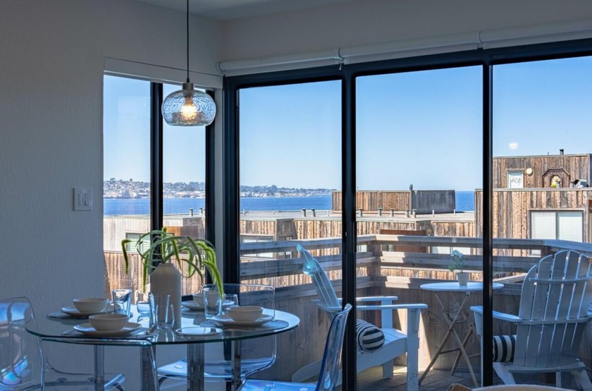 Experience unparalleled coastal living in this exquisite end - Beach Condo for sale in Monterey, California on Beachhouse.com