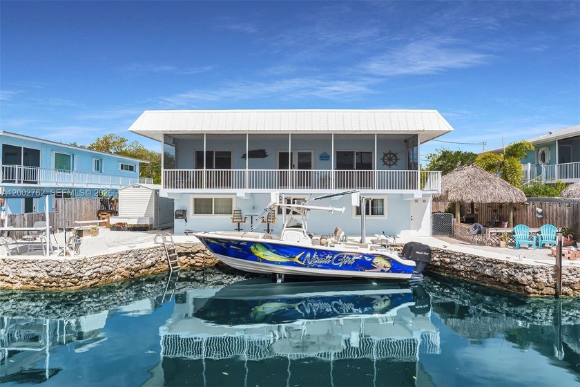 CANAL FRONT - DIRECT OCEAN ACCESS!! Welcome to an experience in - Beach Home for sale in Tavernier, Florida on Beachhouse.com